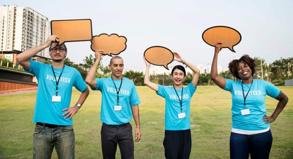 happy charity volunteers