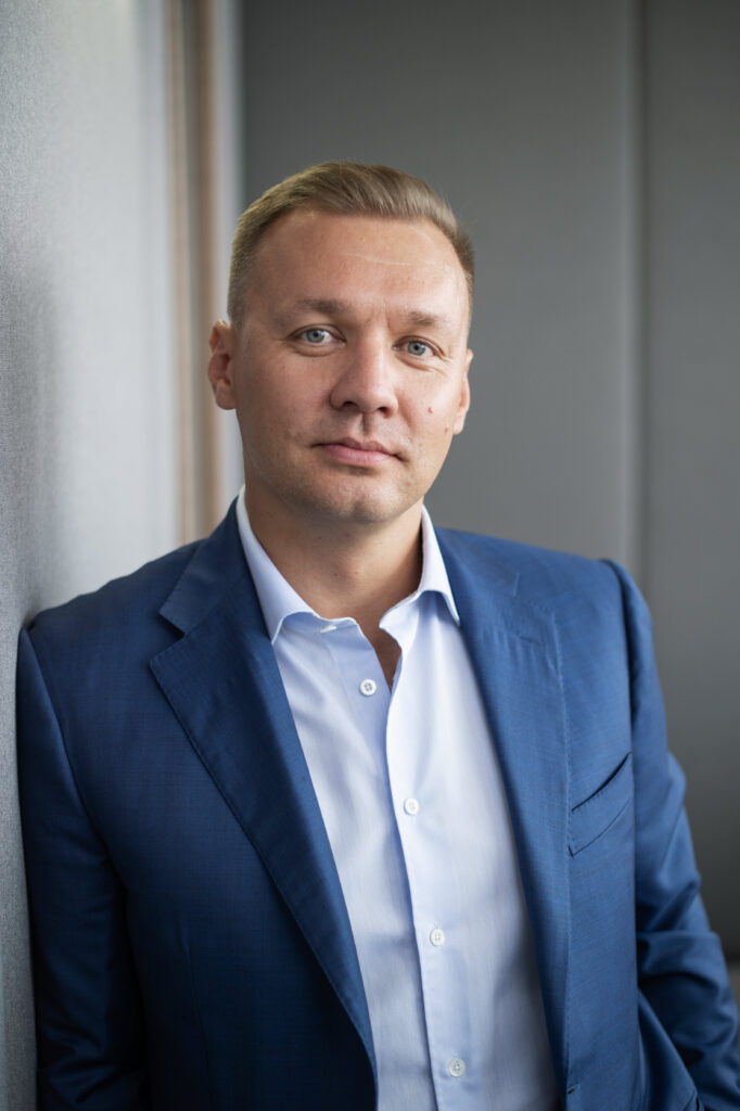 a technology investor whose career bridges traditional manufacturing and emerging digital technologies